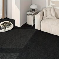 A Roll of Area Rug Featuring Peel-And-Stick Carpeting That Has a Self-Adhesive, Non-Slip Surface